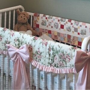 Cottagecore Floral Ruffled Crib rail cover with large stuffed Pink bows